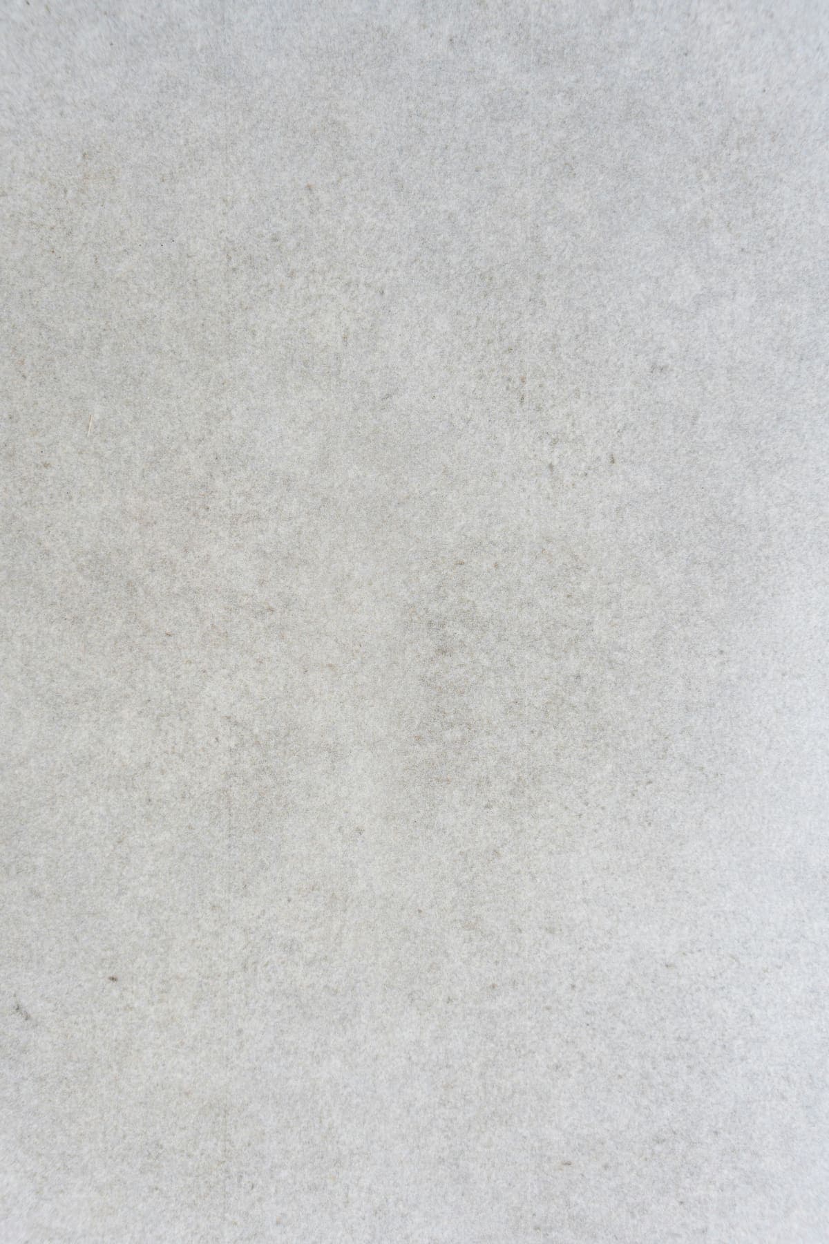 Natural limestone surface in raking light