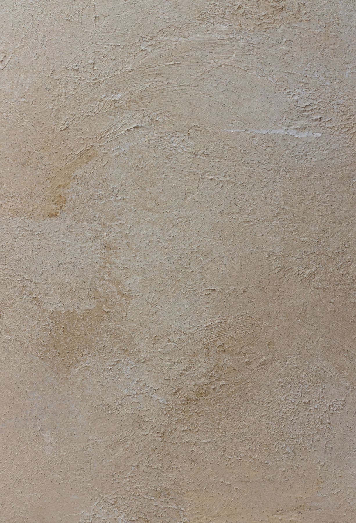 Hand-trowelled lime plaster surface, raked light